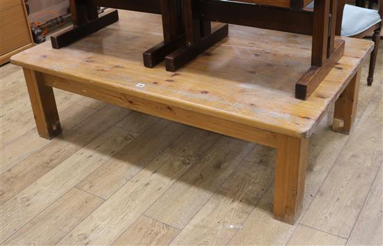 A large pine coffee table W.152cm